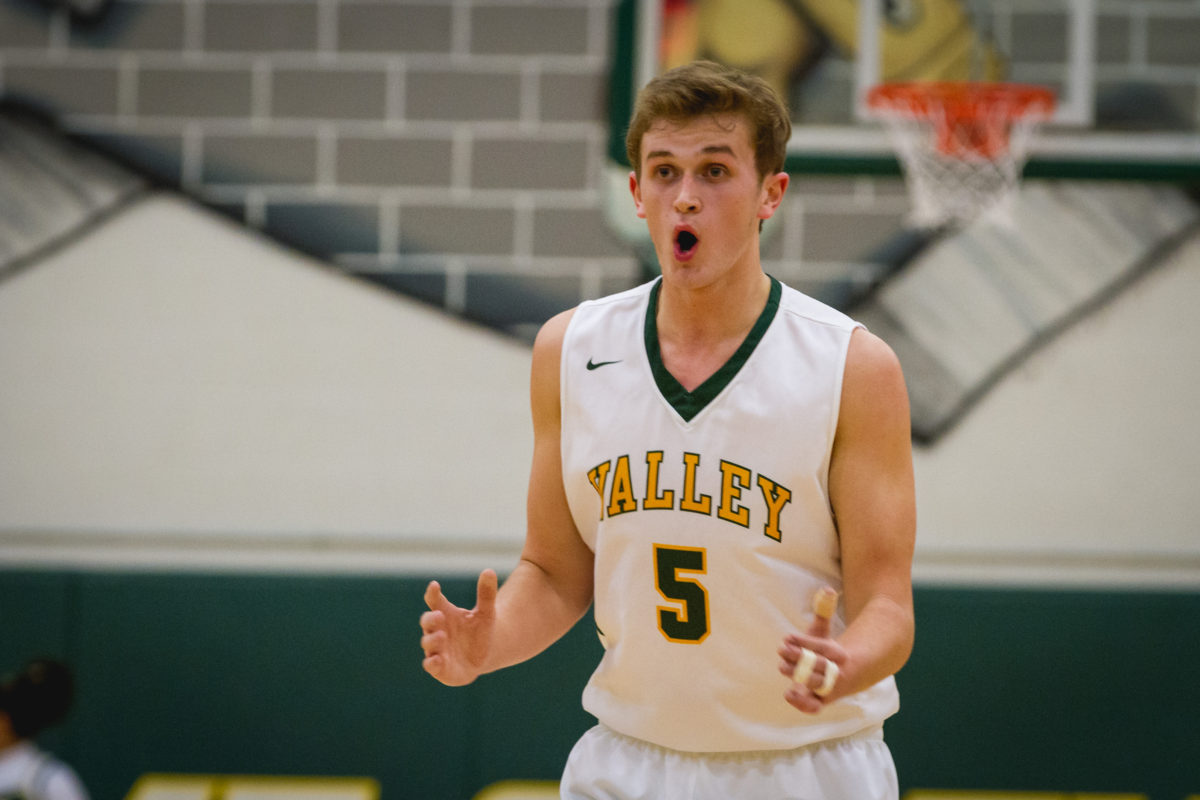 Loudoun Valley senior big man Jason Yoxthimer turned in some productive minutes for the Vikings with 3 points, 3 rebounds, 3 assists and much needed vocal leadership. Full photo gallery by Doug Johnson!