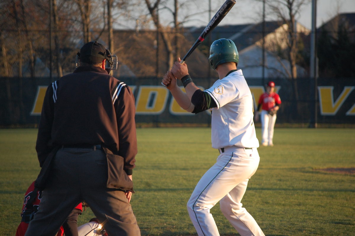 Loudoun Valley senior catcher Hunter Gore had an RBI ground out in the first inning to get the Vikings on the board early. Photo by Dylan Gotimer.