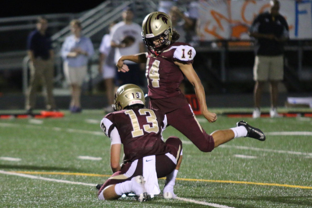 Broad Run junior kicker Atilla Buri buried a field goal late in the second quarter to give the Spartans a 15-point halftime lead. Photo by Dave Harmon.