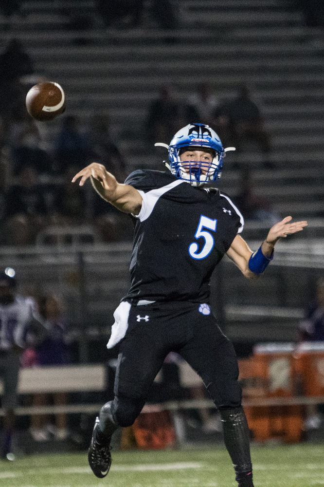 Tuscarora sophomore quarterback Justin Allen has led his team to three consecutive wins after holding on to defeat Potomac Falls on October 7 in Leesburg. Photo gallery by Robert Johnson!