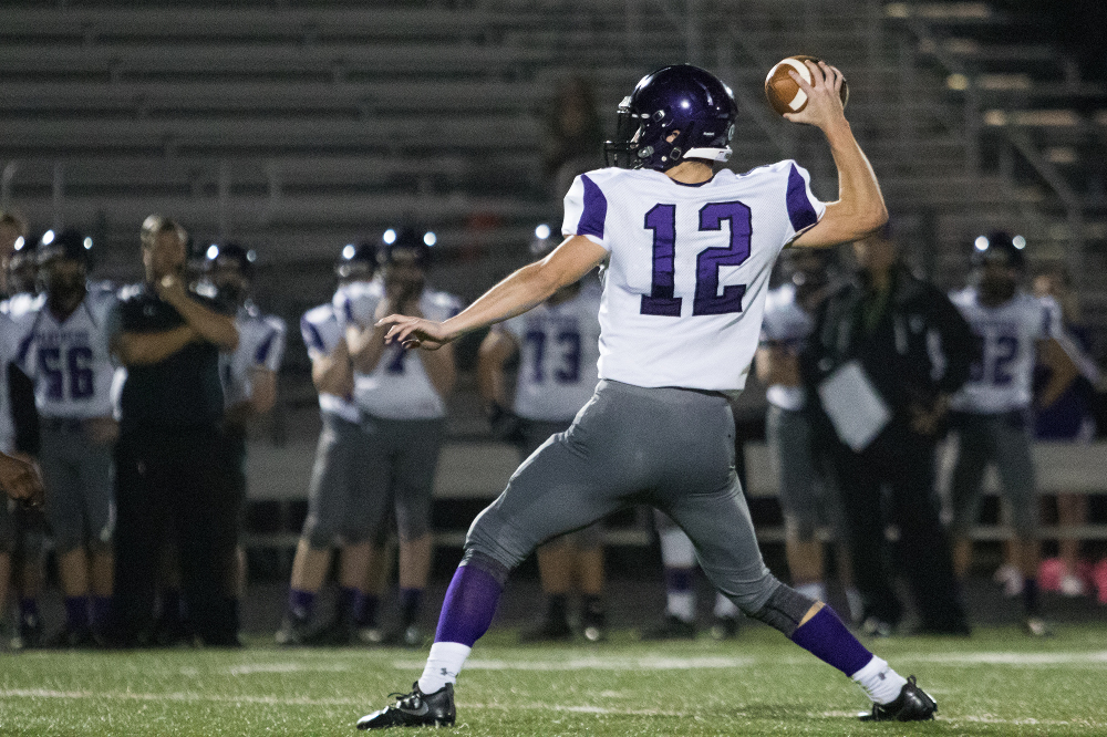 Potomac Falls junior quarterback Hunter Lawall drove his team down the field for three legitimate scoring chances in the fourth quarter but the Panthers fell short in overtime. Photo gallery by Robert Johnson!