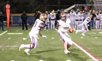 Football: Broad Run Rolls Past Loudoun County in Season Opener Brett Griffis of Broad Run Football hands the ball off to Kyle Davis during the Spartans' win at Loudoun County on February 23 in Leesburg