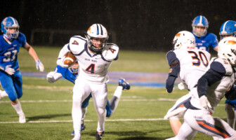 Football: Briar Woods Shuts Out Riverside in Season Opening Win Briar Woods junior running back Evan Rutkowski breaks free from a tackle